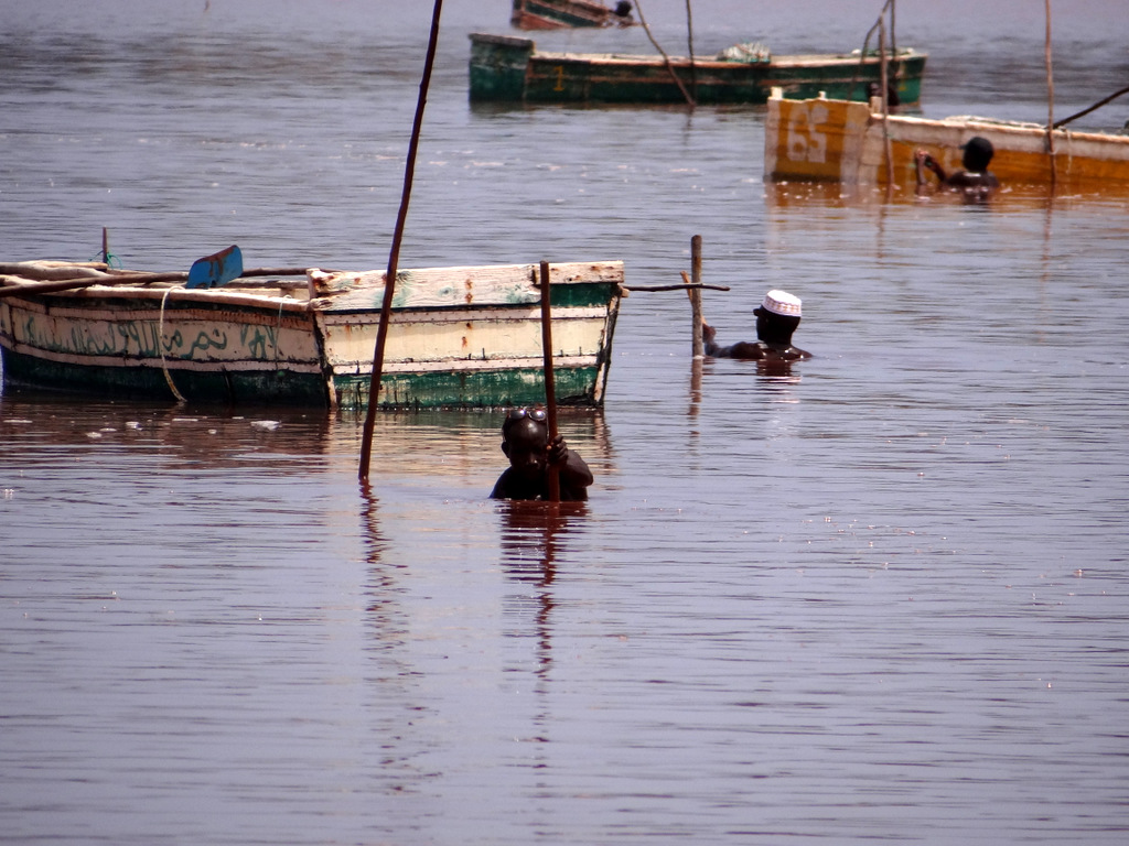 Gathing Salt at Lac Rose by purdon