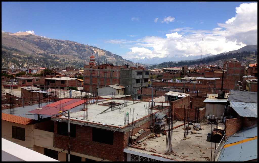 Huaraz skyline with Nevado Huascaran in the background by Gabriel