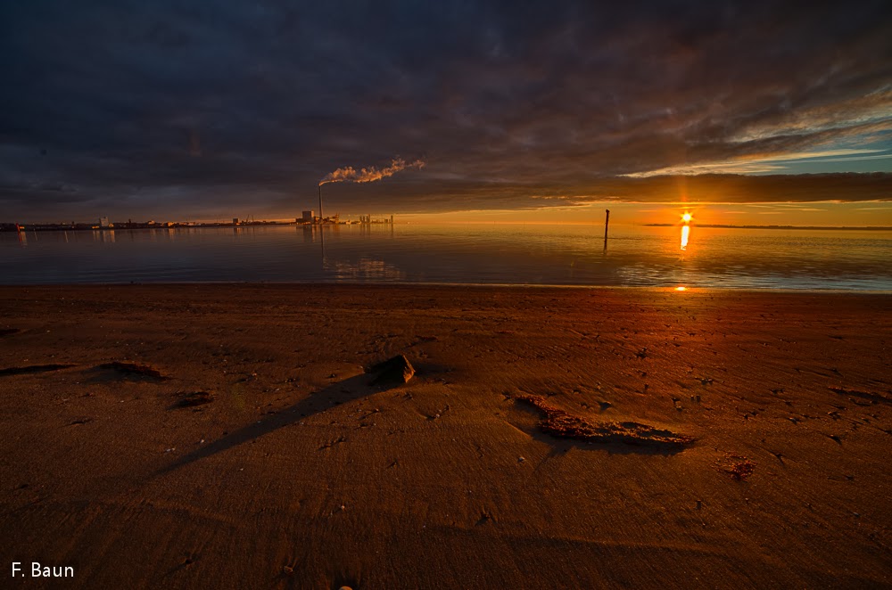 Solopgang over Fanø by F. Baun