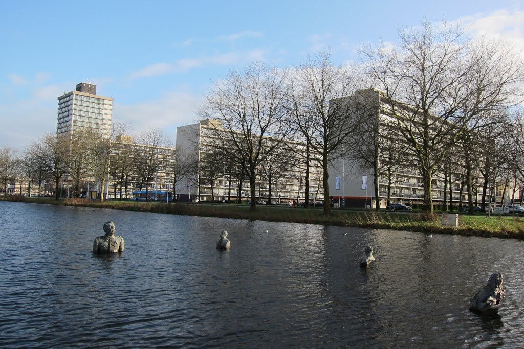 Overview of Presikhaaf dwelling flats and shopping mall with art in the pond by Henq