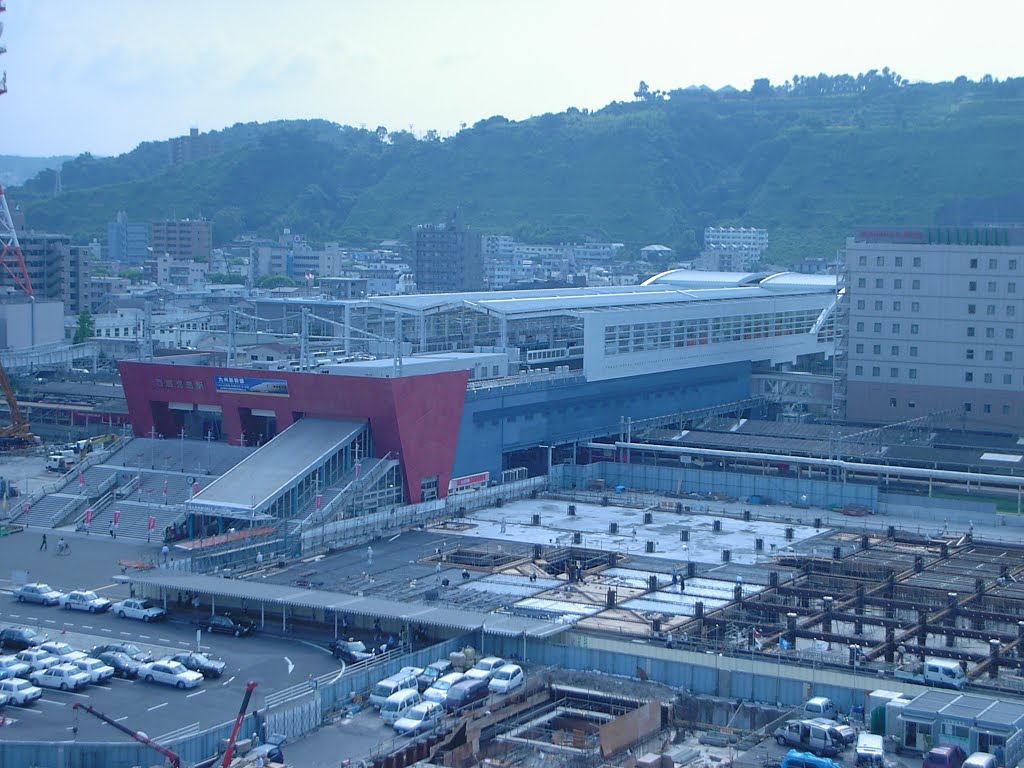 Kagoshima-chuo (name from 2004) station. A building, which will have a Ferris wheel on top, will block this view of the shinkansen platforms in due course by HoodCP