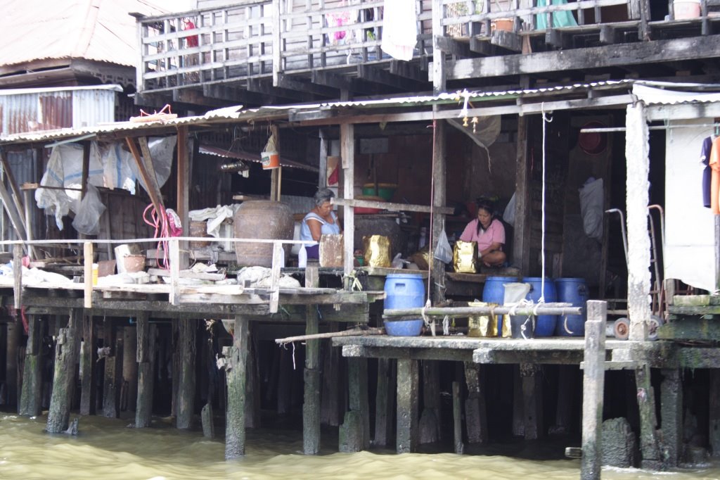 Bangkok's Canal And Local Residents by Olga Mishu