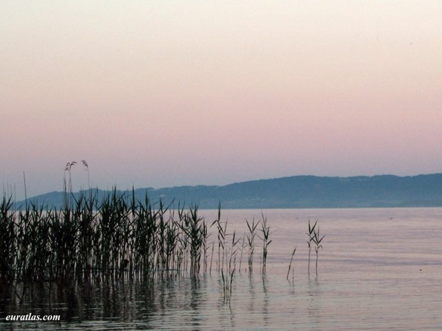 Twilight on the Lake of Neuchâtel by Christos Nussli