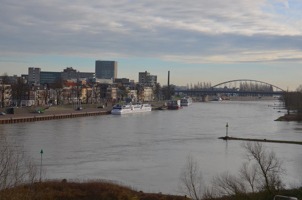 Winterview of the Arnhem Rhine promenade with the John Frost bridge under a nice sky by Henq