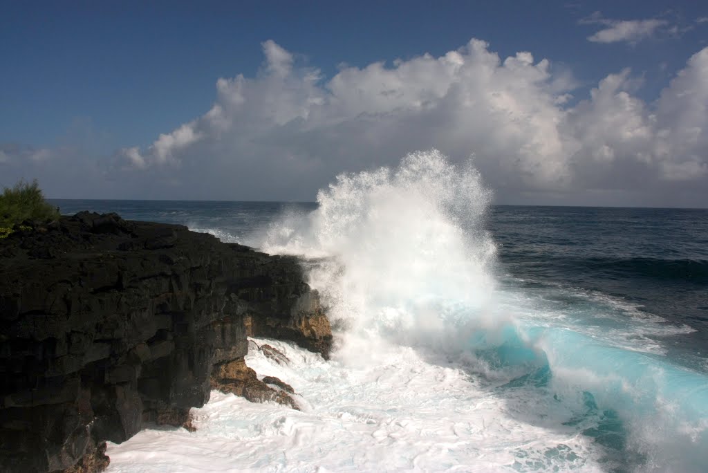 Huge wave crashing against the cliff by Jake Kleinknecht