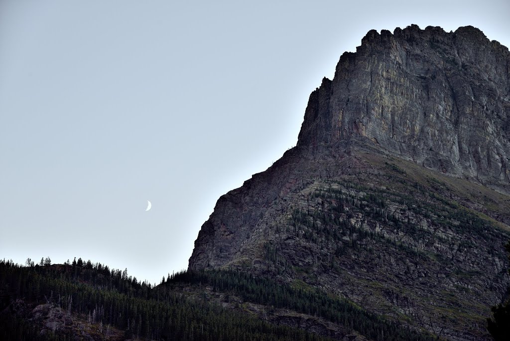 The Moon and Grinnell Point. A view of the moon while walking around Swiftcurrent Lake one early evening. by thorsenmark