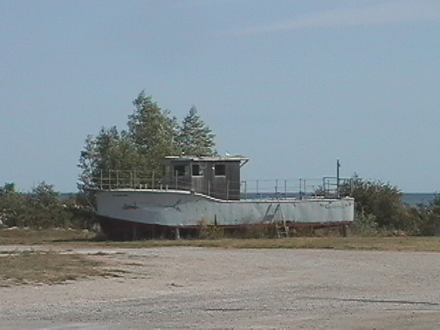 Abandoned boat in Rogers City by Kerry2Kerry