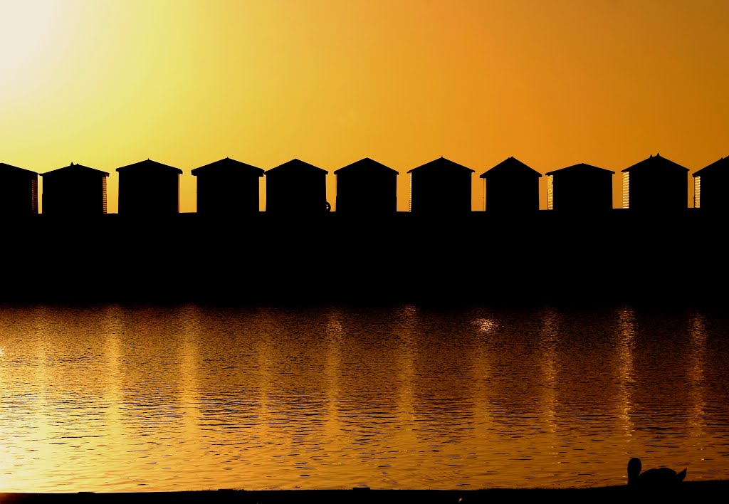 Beach huts at dawn by BexPhotos