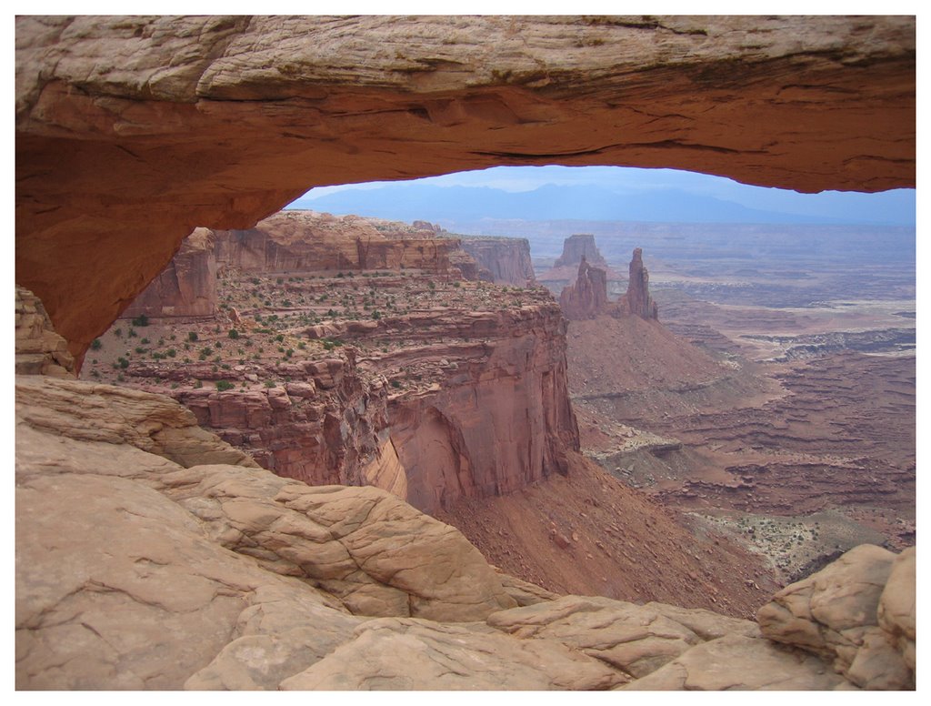 View through the mesa arch in island in the sky, canyonlands, utah by Andrzej Semeniuk