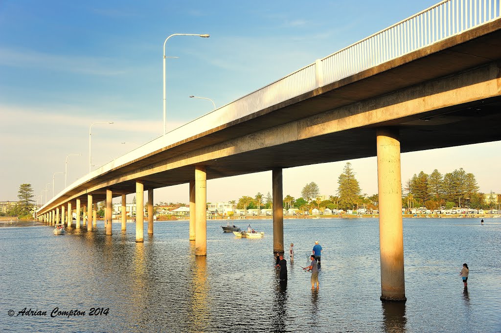 Fishing at low tide under The Entrance Bridge, 2011. by Adrian Compton