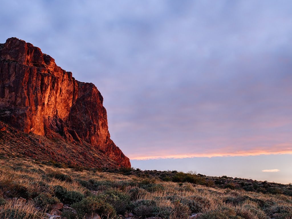 Cliffs turned pink in the sunset by bcm79