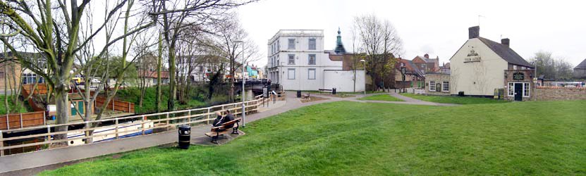 The river Nene, town bridge and the Acre pub from the green outside the library by Callum Grant