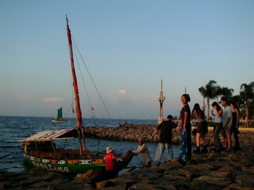 Ancol, Jakarta - Passengers queueing for a trip by Roderick C Wahr