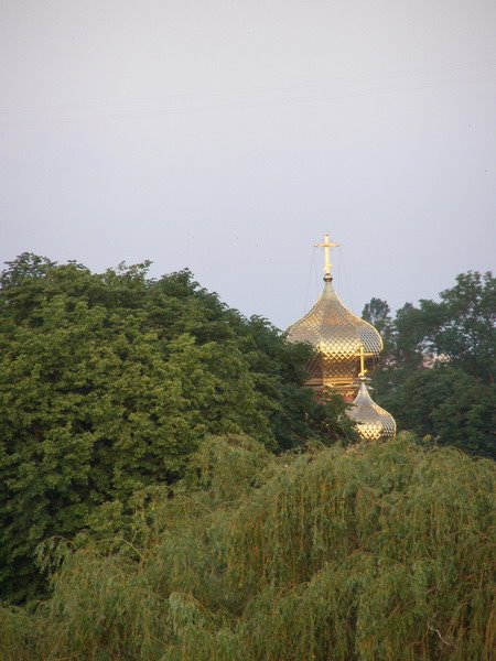 Church hidden in trees near the Hill of Glory by Byelopolskyy