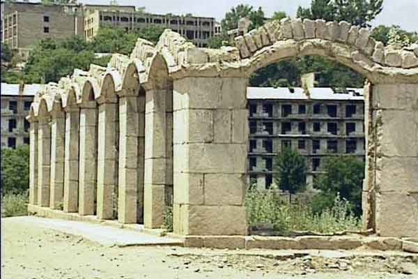 Shusha. Azerbaijan. Ruins of the Old Caravansarai building in the central Bazarbashy square after occupation by Rovshan Talishinski