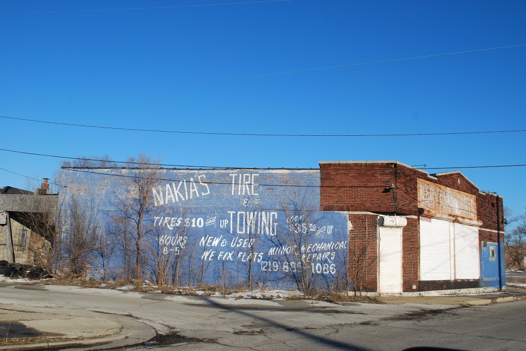 Nakia's Tires at 15th Ave by Lotzman Katzman