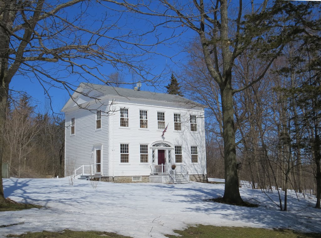 Hayes Inn, established in 1837. One of the last of the Georgian style houses which were very symmetrical. The windows were all the same size, equally spaced, and one over the front door. The fan window over the front door is a classical Loyalist style. Each window sash had 12 panes of hand made glass. by Steve Manders