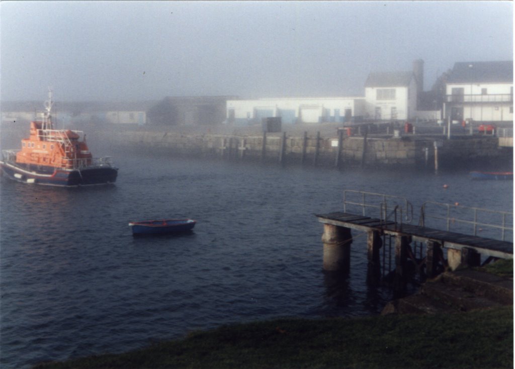 Portrush harbour on a misty morning by Len Firewood