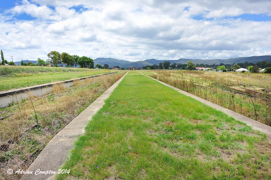 Panoramic view of the abandoned large transshipment platforms at break-of-gauge at QLD Border - looking north. Jennings, NSW. by Adrian Compton