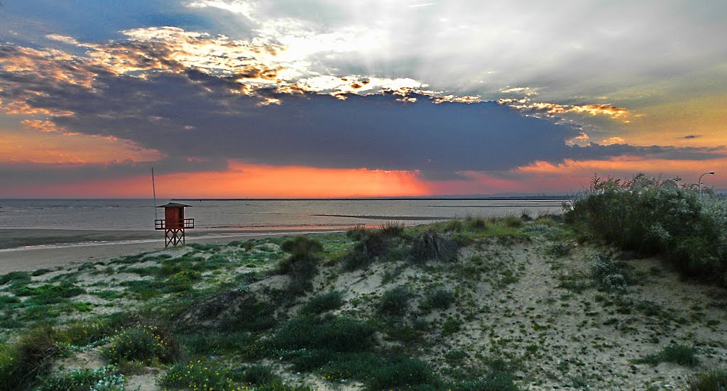 Isla Canela beach, sunset over Guadiana river.Far west Portugal. by Feika