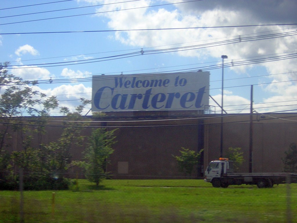 Welcome To Carteret Sign by Kyle Stephen Smith