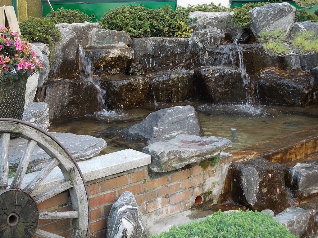 Waterfall feature overlooking beach by Phaedrus Fleurieu