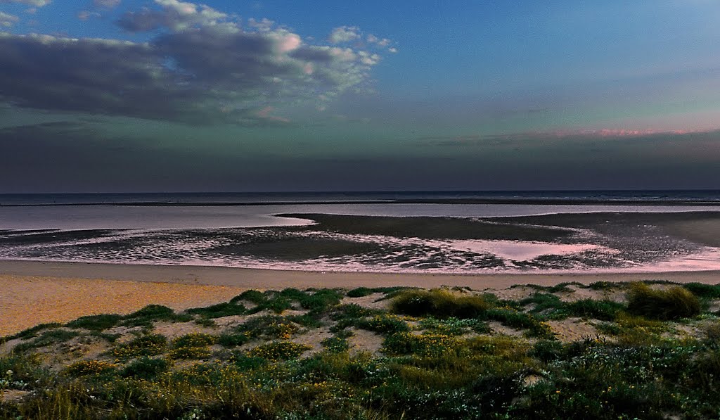 Darkening beach Isla Canela by Feika