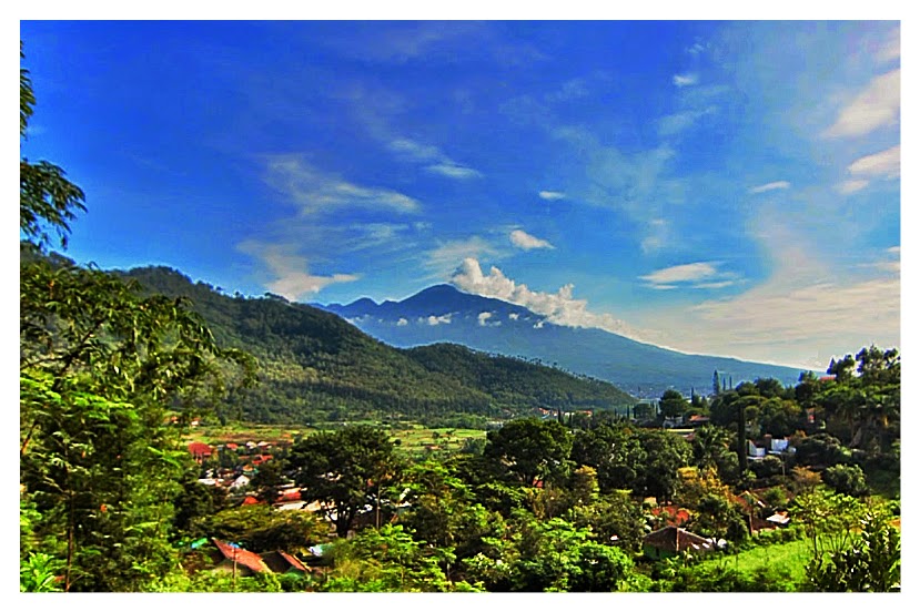 Volcano Semeru seen from hill @ Batu region by Tiffany Liem