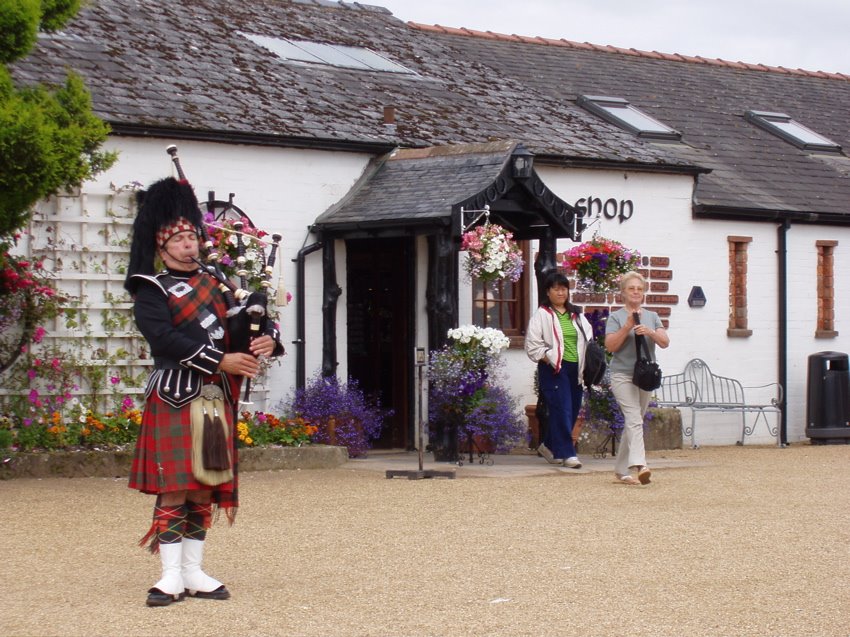 Mb - Bagpiper in Gretna Green by Margrit Berger