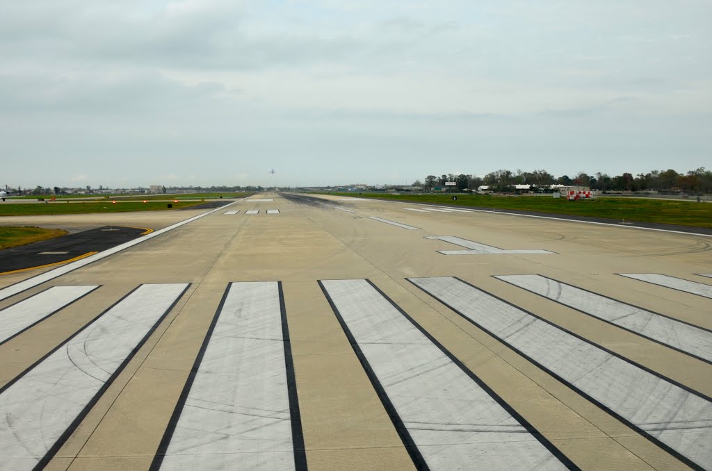 Runway at New Orleans International Airport by Buddy Rogers