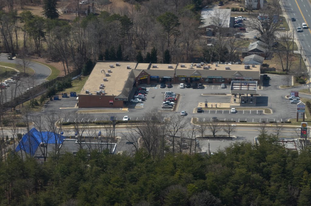 Strip mall on Parke West Drive by Buddy Rogers