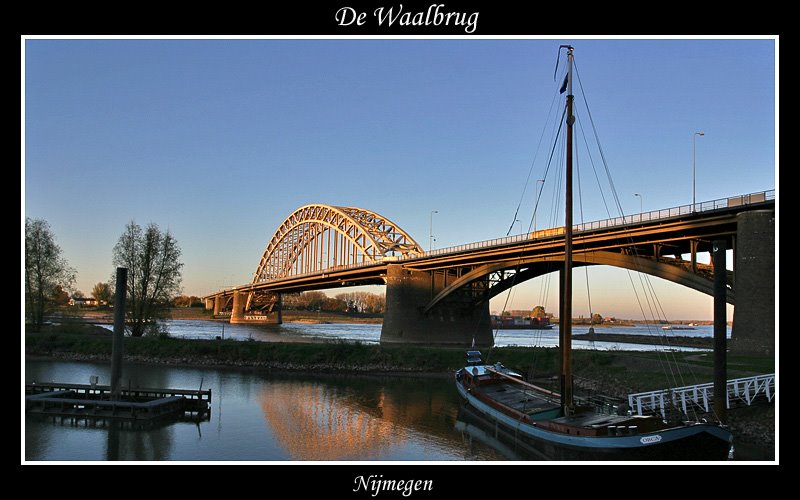 Nijmegen bridge in golden glow by vinnie1966