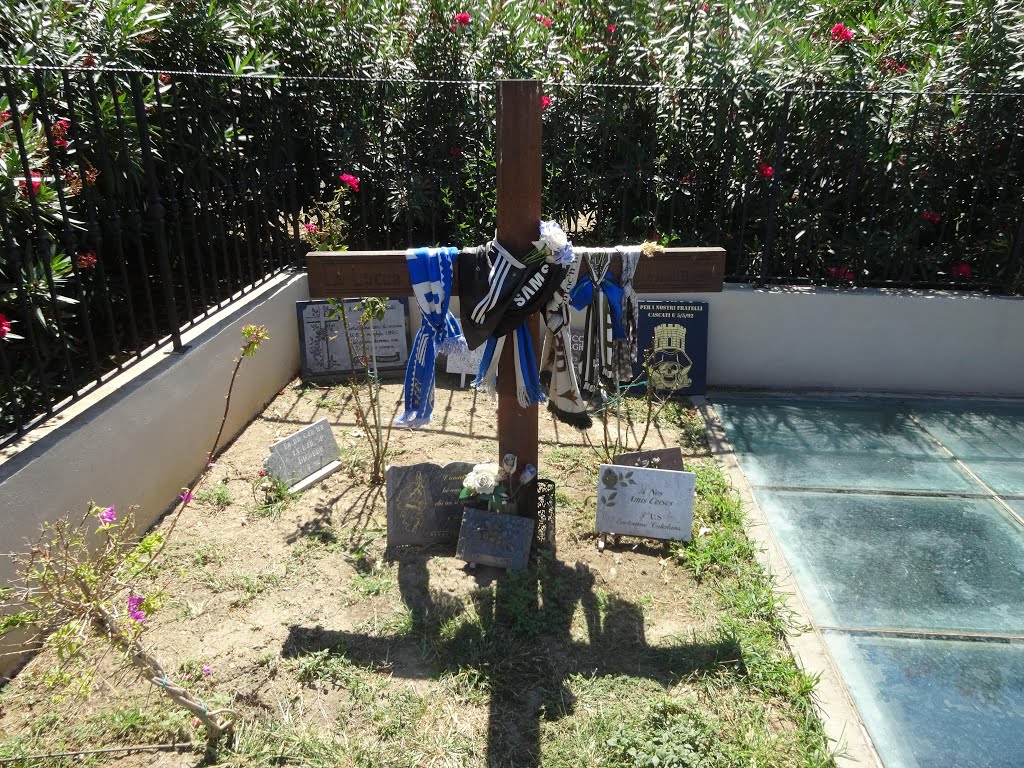 The cross close to the monument "Catastrophe de Furiani" by Diego Giuseppe