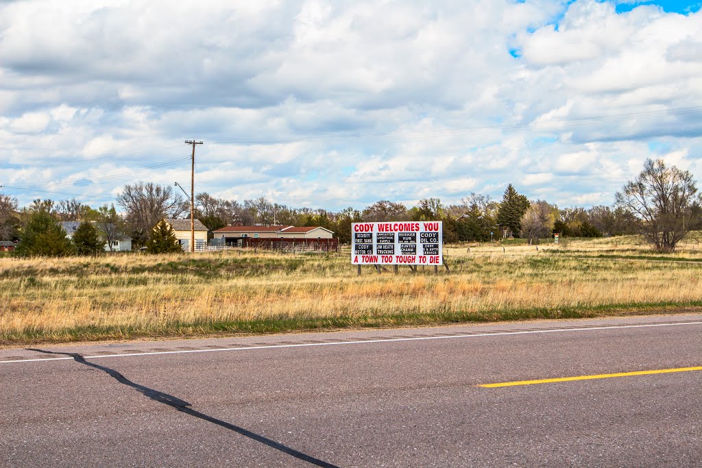 On U.S. Route 20, near its intersection with B St., viewing east-north-easterly at welcoming sign for the town of Cody, Nebraska by elifino57