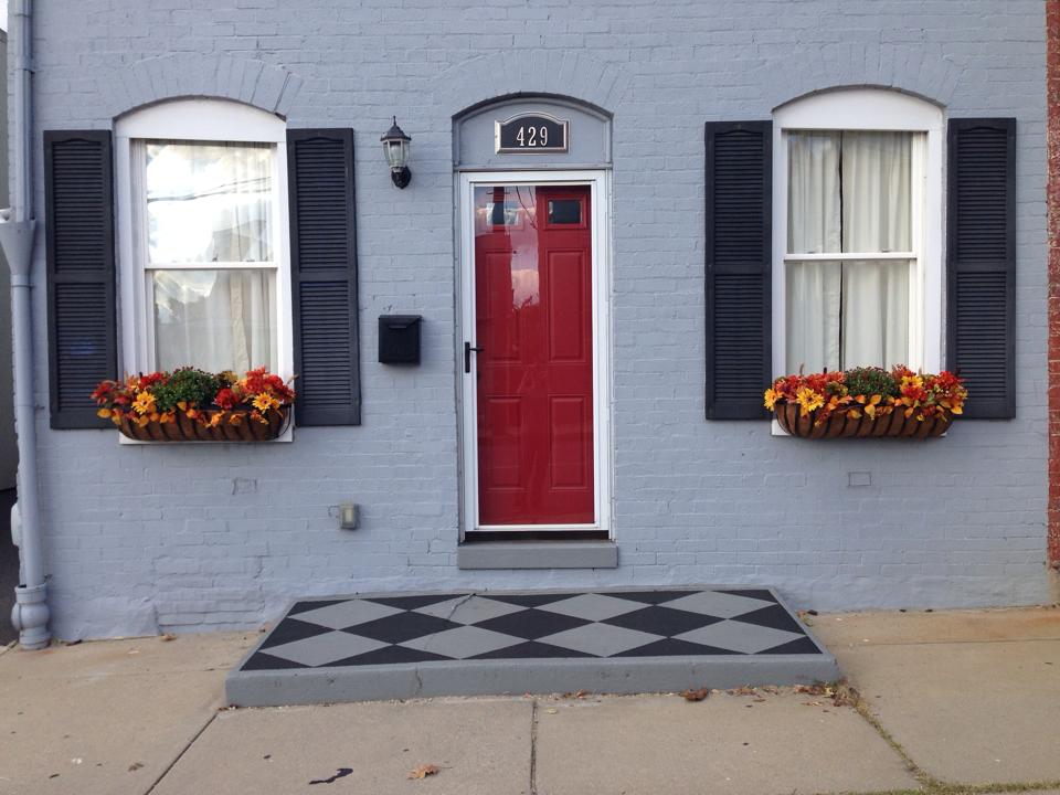 Red door, old storm door by Michael French