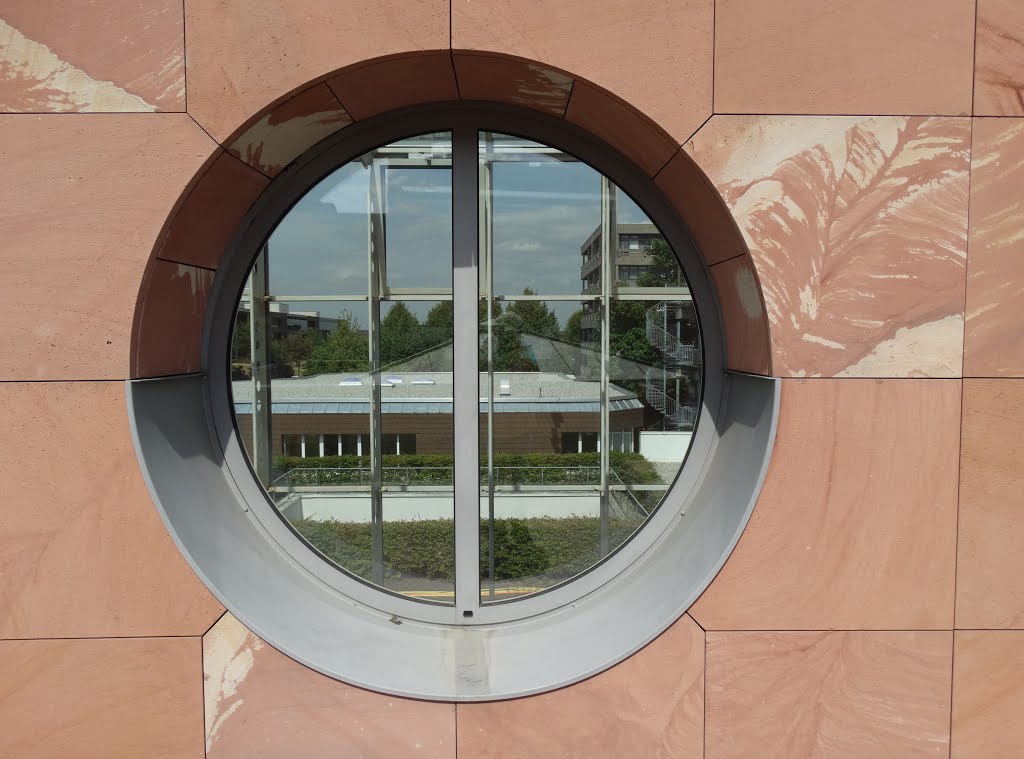 Goethe University Campus Riedberg - an architectural gem: circular windows in the wall of the Magistrale by Guenter Hubmann