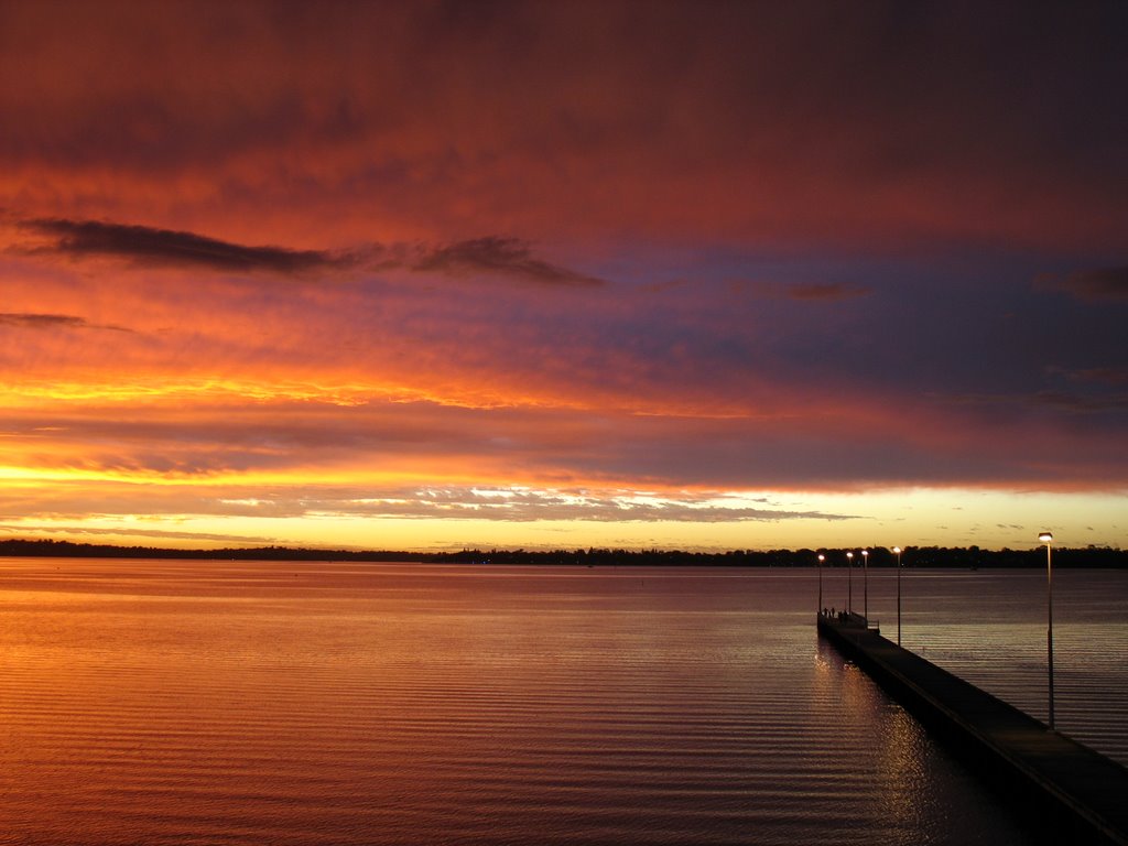 Sunset over jetty in Como by Doddle