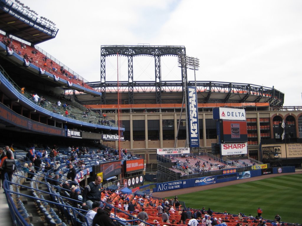 Shea Stadium looking towards the outfield and CitiField by dmgerbino