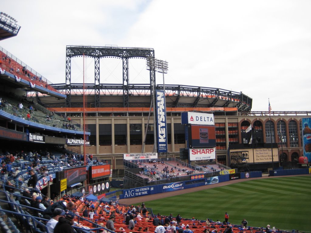 Shea Stadium looking towards the outfield and CitiField by dmgerbino