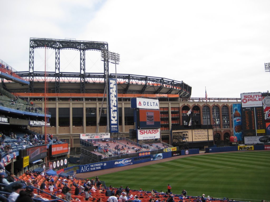 Shea Stadium looking towards the outfield and CitiField by dmgerbino