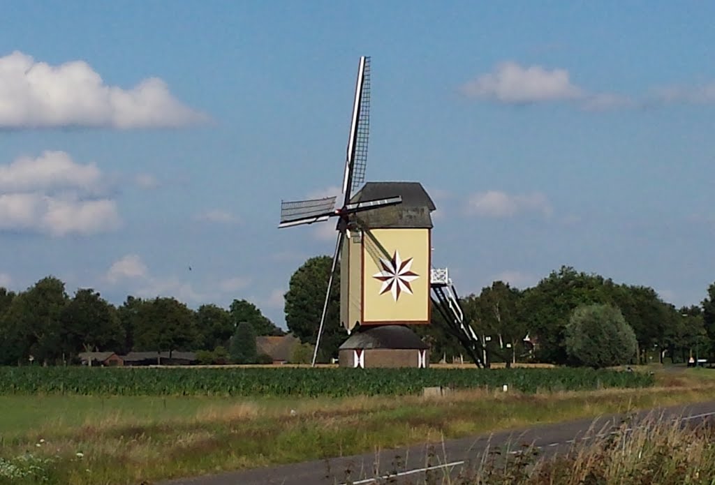 Old windmill Wanroij by Fam. Denkers