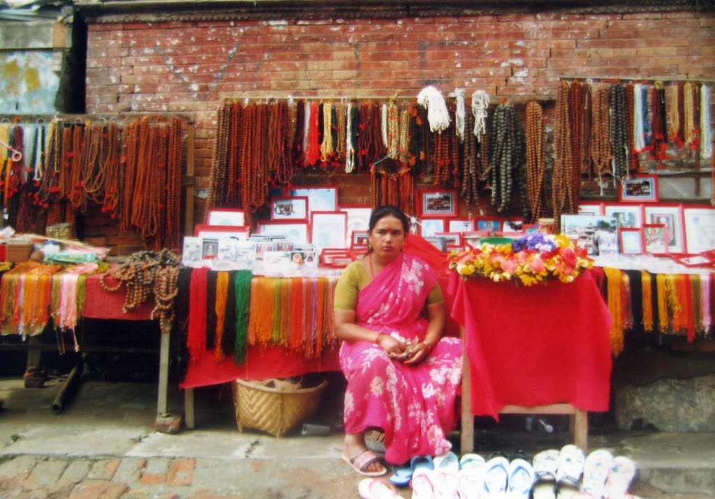 Rudraksh mala seller , Pashupati, Kathmandu, Nepal 2001 by Marco Carnelli