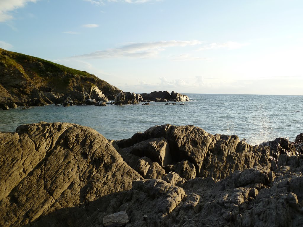 High tide at Combesgate Beach by Rachel J