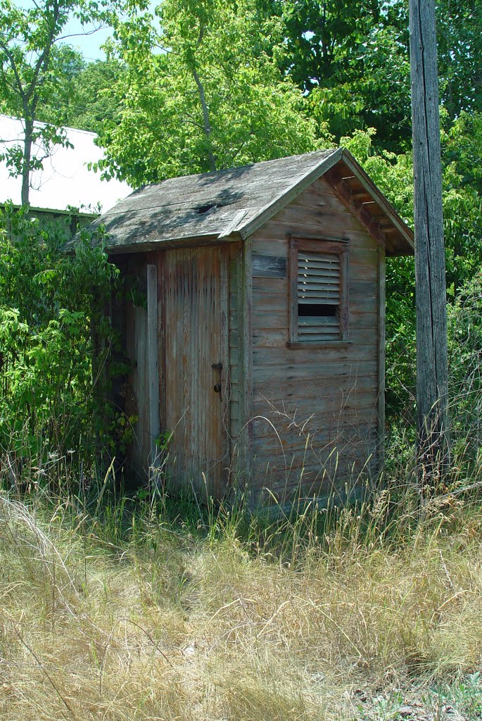 Outhouse next to former CMStP&P railroad depot at Juda, Wisconsin by illinichip