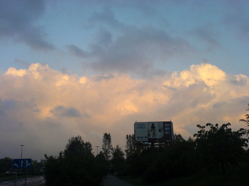 Cloudy Sky over Jana Pawła II by Mariusz Niemiec