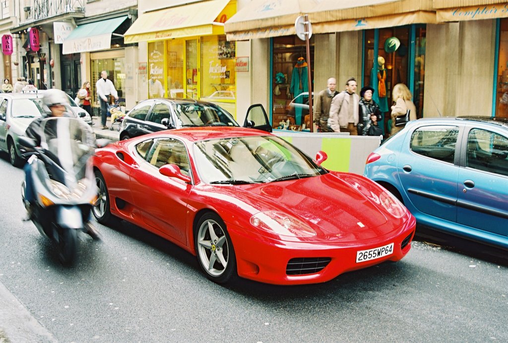 Ferrari on street by Radosław Radziszewsk…