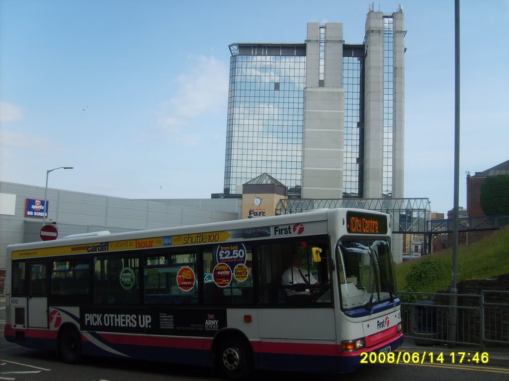 BT Tower with bus driving pass by Rory Thudgutter