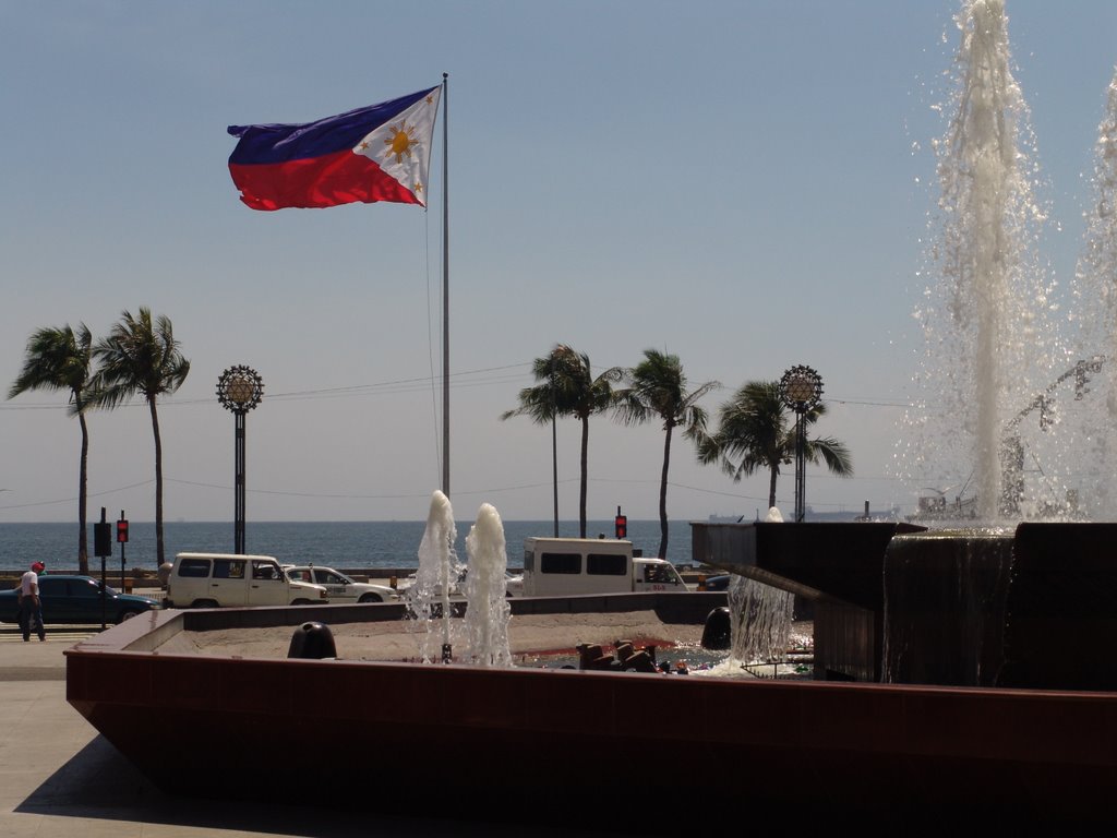 Philippines national flag in Manila bay. by Tim.Ding