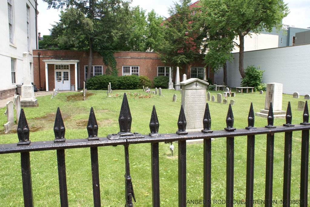 CEMETERY ON SIDE OF CHURCH by ANGEL N RODRIGUEZ