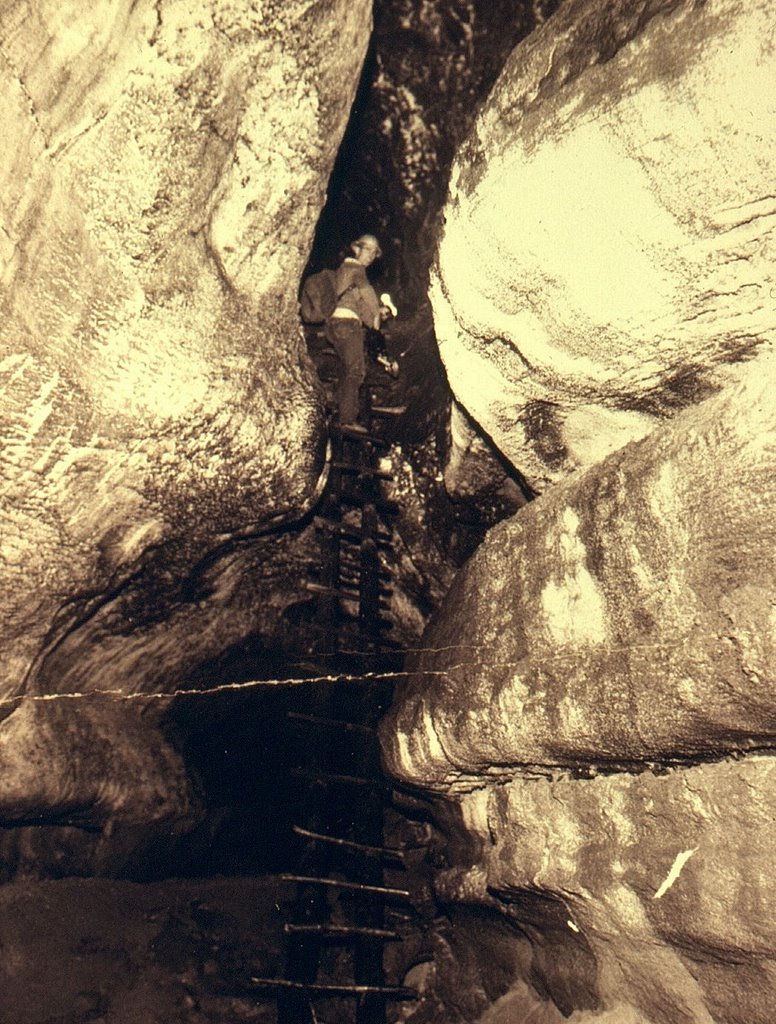 Ape Cave entrance drop, circa 1958. This historic photo was printed with the negative reversed. by Jim Nieland